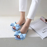 Wearing flat slippers women's shoes 2021 Korean version of the summer new large bow satin round head sandals Wild half slippers